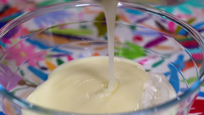 Combine yogurt, cream mixture, and melted gelatin. Adjust sweetness if needed.