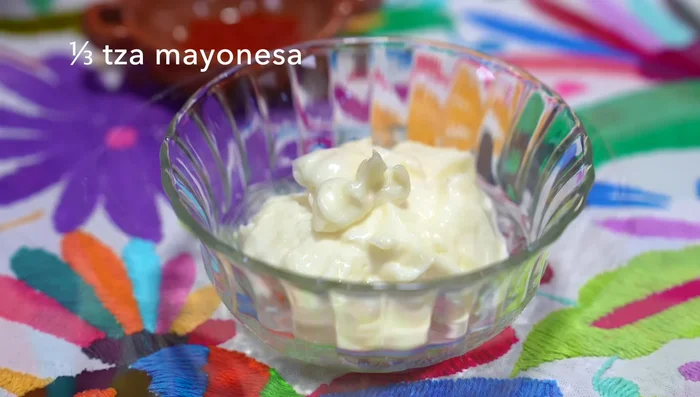 Prepare spicy mayonnaise: Mix mayonnaise, hot sauce, paprika, and garlic powder.