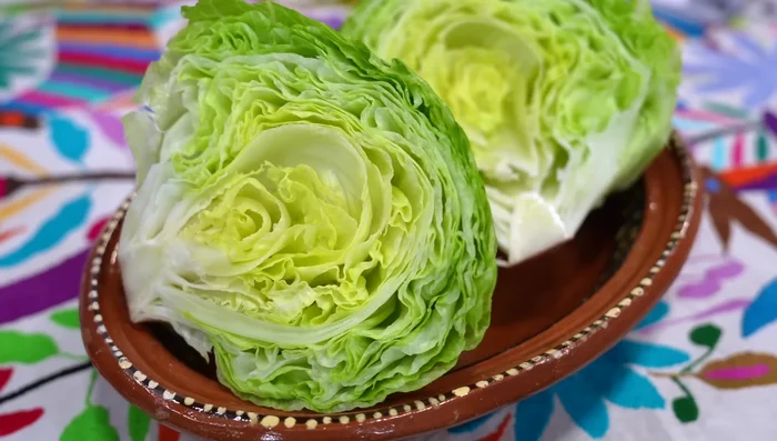 Wash and thinly slice lettuce.