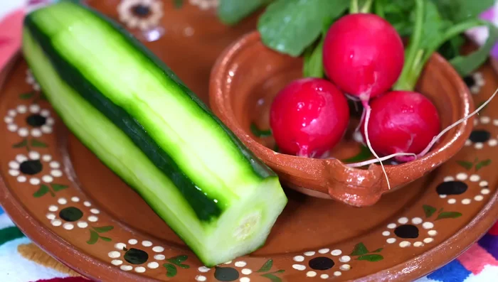 Cut cucumber into cubes.