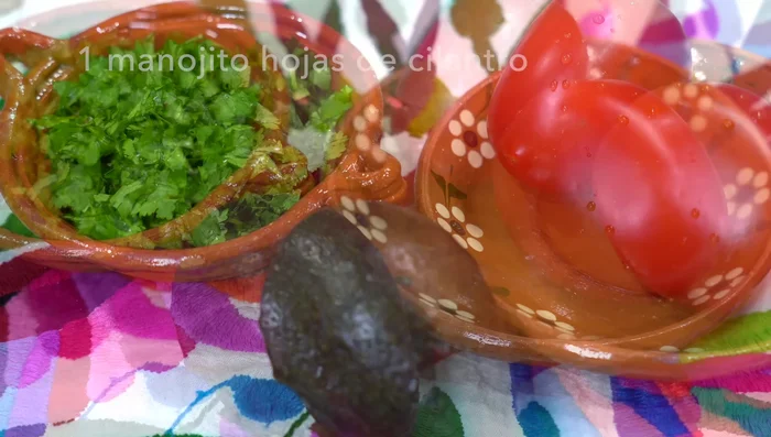 Chop cilantro and tomatoes.