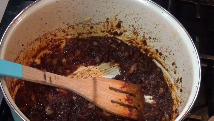 Add the beans to the pot with the chorizo.
