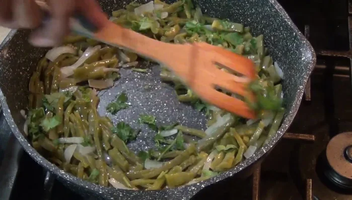 Stir in cilantro and season with salt to taste.