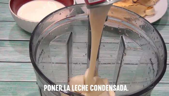 Add the evaporated milk, condensed milk, water, chocolate powder, cinnamon powder, and vanilla extract to the blender.