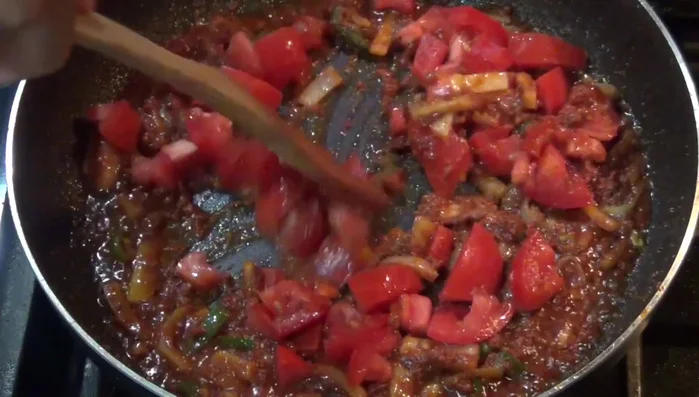 Add the chopped tomatoes and chipotle chili sauce. Season with salt to taste. (Start adding at 161.85)