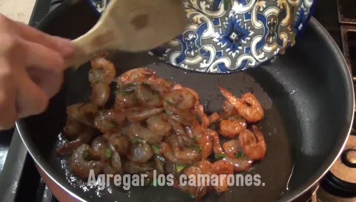 Heat oil in a pan and cook the shrimp for about 8 minutes until pink and cooked through. Set aside.