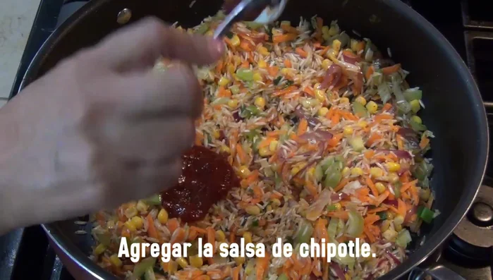Stir in the chipotle chili sauce (to taste).