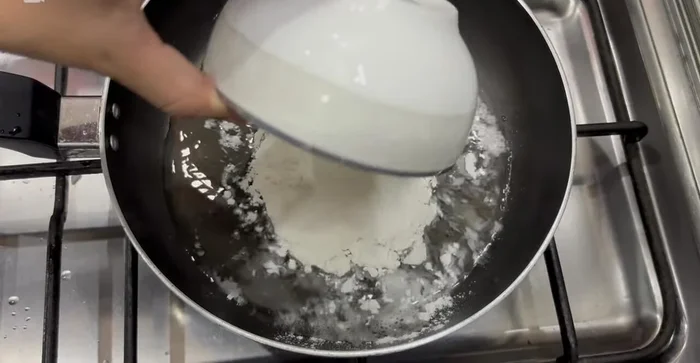 In a separate pan, sauté flour in oil (or butter) until fragrant, stirring constantly to prevent burning.