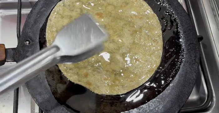 Lightly toast tortilla wraps in oil until slightly soft. Do not overcook.